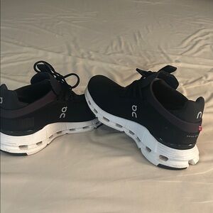 On Running Black and White Athletic Shoes